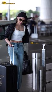 actress Sherlyn Chopra sexy and stylish in a jacket at airport