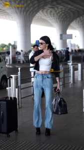 actress Sherlyn Chopra sexy and stylish in a jacket at airport