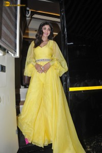 actress shilpa shetty spotted in a yellow dress in her caravan