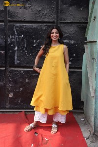Shilpa Shetty in a yellow salwar kameez dress