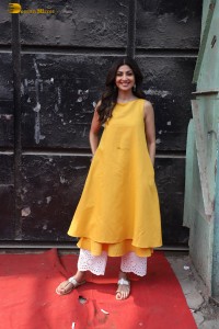 Shilpa Shetty in a yellow salwar kameez dress