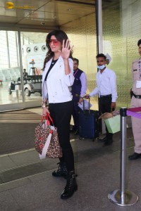 actress Shilpa Shetty dressed in black and white