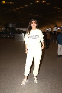 actress Shilpa Shetty in a white track suit