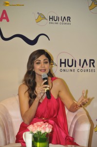 actress Shilpa Shetty sizzles in a red dress at an event