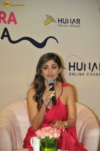 actress Shilpa Shetty sizzles in a red dress at an event