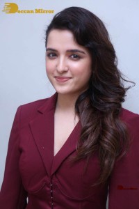 Singer and Actress Shirley Setia photoshoot in a red dress