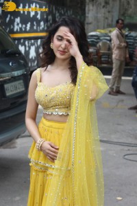 Shirley Setia in a Yellow Dress