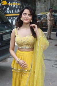 Shirley Setia in a Yellow Dress