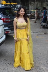 Shirley Setia in a Yellow Dress