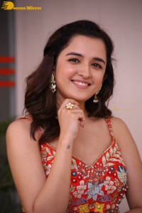 Telugu and Bollywood Actress Shirley Setia in a red dress