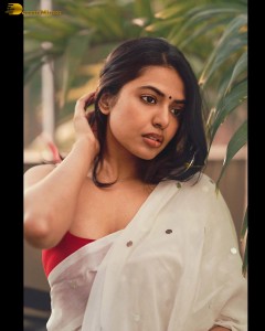actress Shivani Rajashekar sensual looks in a white saree