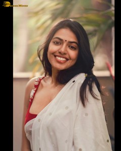 actress Shivani Rajashekar sensual looks in a white saree