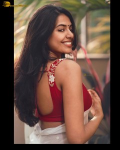 actress Shivani Rajashekar sensual looks in a white saree