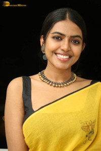 actress shivani rajashekar beautiful looks in a yellow saree
