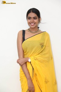 actress shivani rajashekar beautiful looks in a yellow saree