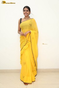 actress shivani rajashekar beautiful looks in a yellow saree