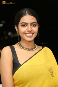 actress shivani rajashekar beautiful looks in a yellow saree