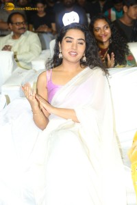 Telugu Actress Shivathmika in a white saree at a movie function