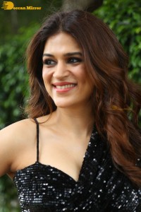 Shraddha Das in a black slit dress