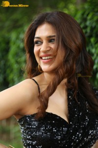 Shraddha Das in a black slit dress