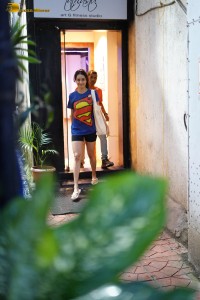 actress Shraddha Kapoor cute in a superman t-shirt and shorts