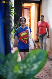 actress Shraddha Kapoor cute in a superman t-shirt and shorts