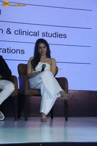 Shraddha Kapoor in a white dress at a function