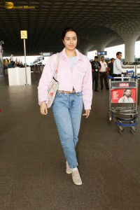 actress Shraddha Kapoor chic look in a pink shirt and denim jeans at airport