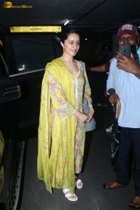 actress Shraddha Kapoor in a yellow salwar at the airport