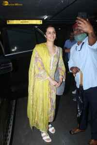 actress Shraddha Kapoor in a yellow salwar at the airport