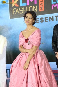 actress shriya saran in a low neck pink dress at a event