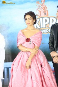actress shriya saran in a low neck pink dress at a event