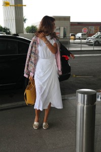 actress shriya saran stylish look in a white dress at the airport