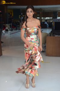 south actress shriya poses in a cute shoulderless dress