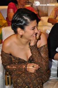 Shruti Haasan in a golden brown dress at a movie function