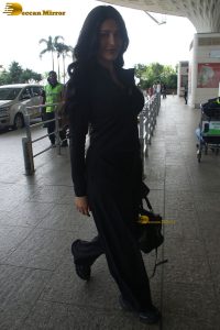 Indian actress Shruti Haasan stylish in a black dress at mumbai airport