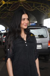 telugu and tamil actress Shruti Haasan spotted in a black dress in mumbai