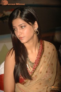 Shruti Haasan in a golden color saree