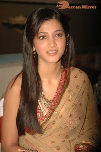 Shruti Haasan in a golden color saree