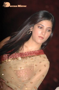Shruti Haasan in a golden color saree