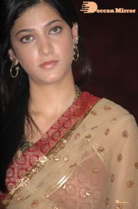 Shruti Haasan in a golden color saree