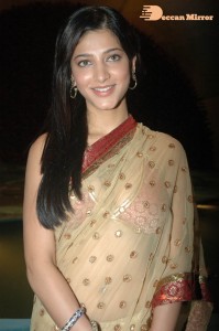 Shruti Haasan in a golden color saree