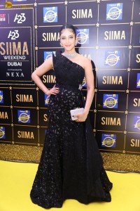 actress Shruti Haasan stylish in a black dress and poses for pictures at at event