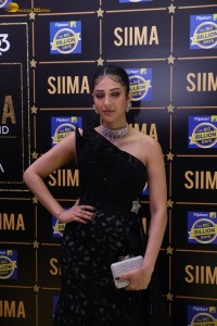 actress Shruti Haasan stylish in a black dress and poses for pictures at at event