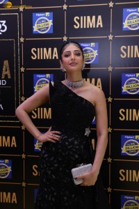 actress Shruti Haasan stylish in a black dress and poses for pictures at at event