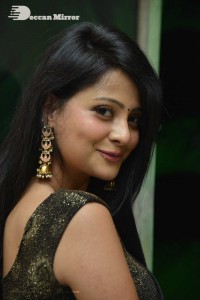Actress Shubhangi Pant posing in a Black Saree for a Photoshoot