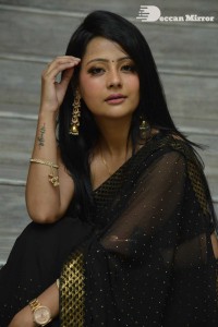 Actress Shubhangi Pant posing in a Black Saree for a Photoshoot
