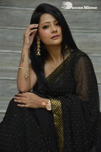 Actress Shubhangi Pant posing in a Black Saree for a Photoshoot