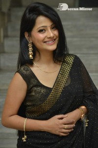 Actress Shubhangi Pant posing in a Black Saree for a Photoshoot