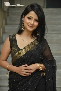 Actress Shubhangi Pant posing in a Black Saree for a Photoshoot